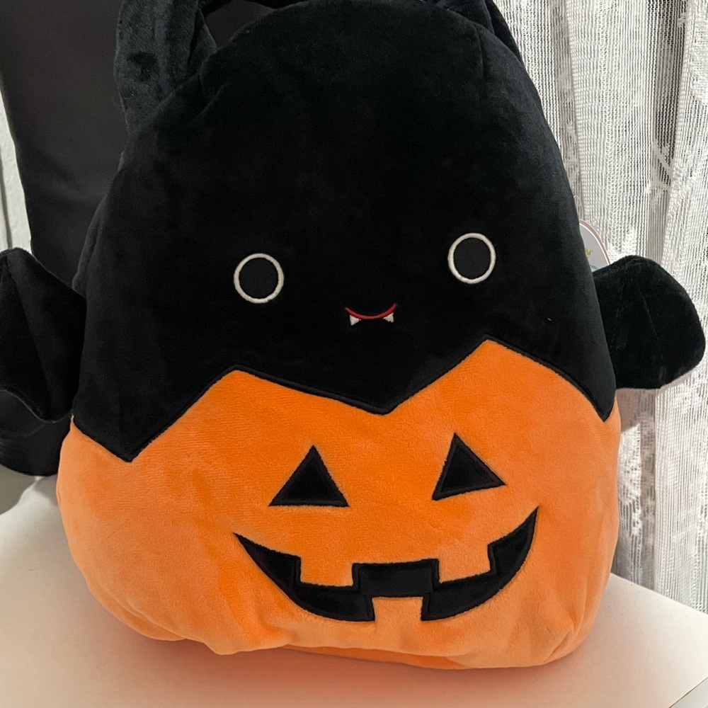 Emily in a pumpkin basket